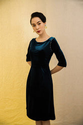 Elegant velvet midi dress with pearl-trimmed sleeves and boat neckline